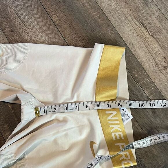 Nike Women's Pro Warm
7/8 Training Tights (Light
Cream/Gold small - Picture 6 of 11